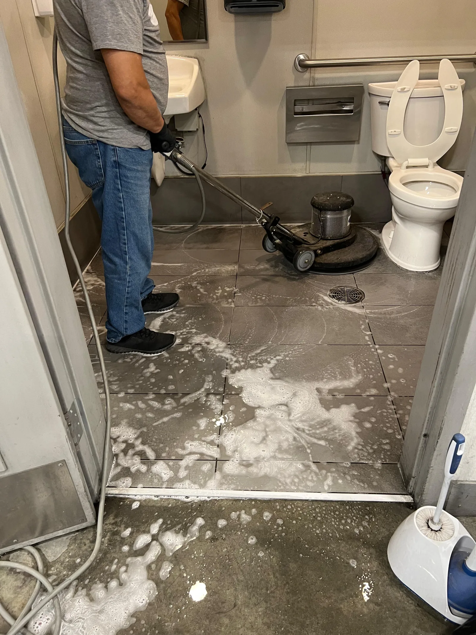Commercial floor scrubbing